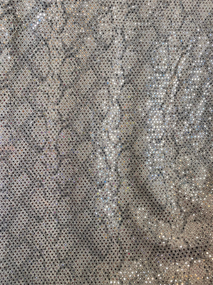 New metallic spandex snake design  blush color with sequins all over 58/60” Sold by the YD. Ships worldwide from Los Angeles California USA.