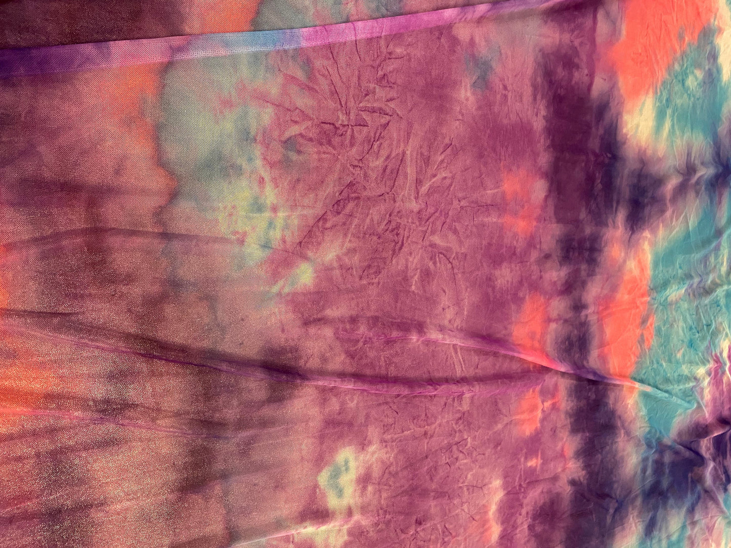 Cotton candy tie dye nylon power mesh 4-way stretch 58/60” Sold by the YD. Ships worldwide from Los Angeles California USA.