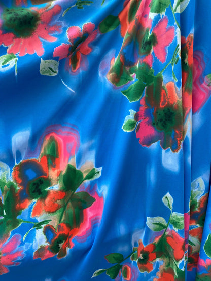 New flower design sapphire/pink color print on nylon spandex 4-way Stretch 58/60” Sold by the YD. Ships worldwide from Los Angeles Californi