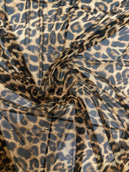 New exotic leopard design print on power mesh 4-way stretch 58/60” Sold by the YD. Ships worldwide from Los Angeles California USA.