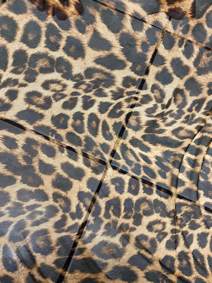 New exotic leopard design print on power mesh 4-way stretch 58/60” Sold by the YD. Ships worldwide from Los Angeles California USA.