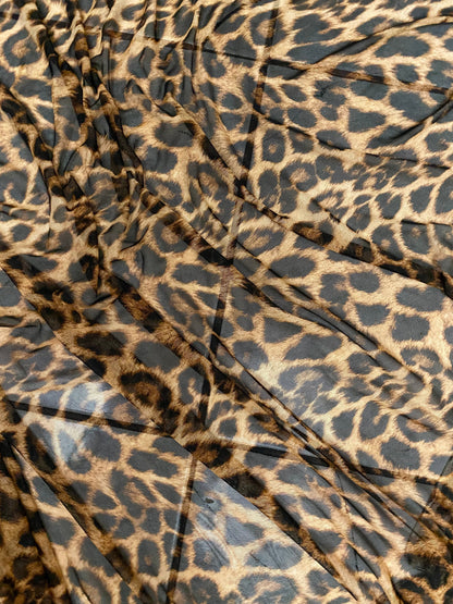 New exotic leopard design print on power mesh 4-way stretch 58/60” Sold by the YD. Ships worldwide from Los Angeles California USA.