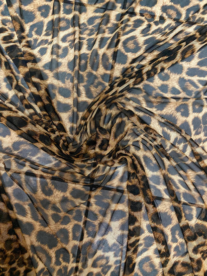 New exotic leopard design print on power mesh 4-way stretch 58/60” Sold by the YD. Ships worldwide from Los Angeles California USA.