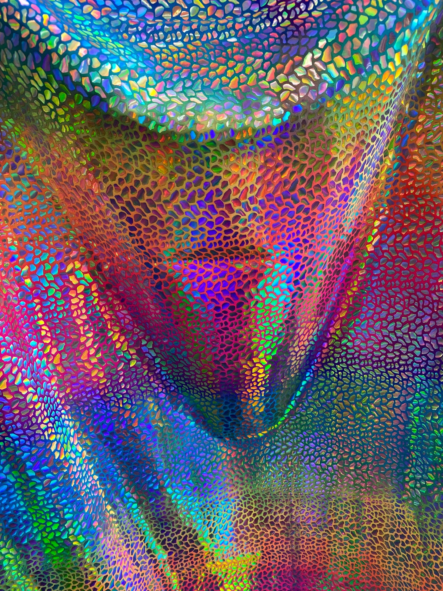 New stone design iridescent sequins on rainbow nylon spandex 4-way stretch 58/60” Sold by the YD. Ships worldwide from Los Angeles CA USA.