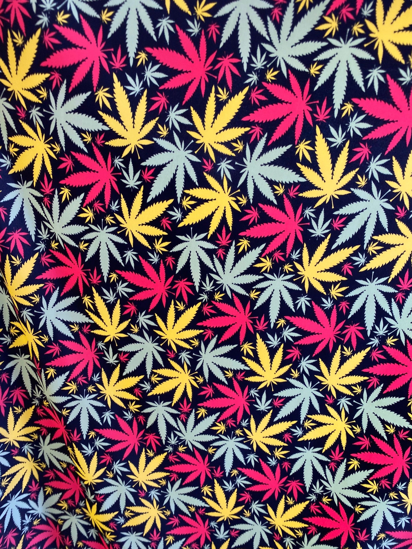 New weed leaf design print on nylon spandex 4-way Stretch 58/60” Sold by the YD. Ships worldwide from Los Angeles California USA.