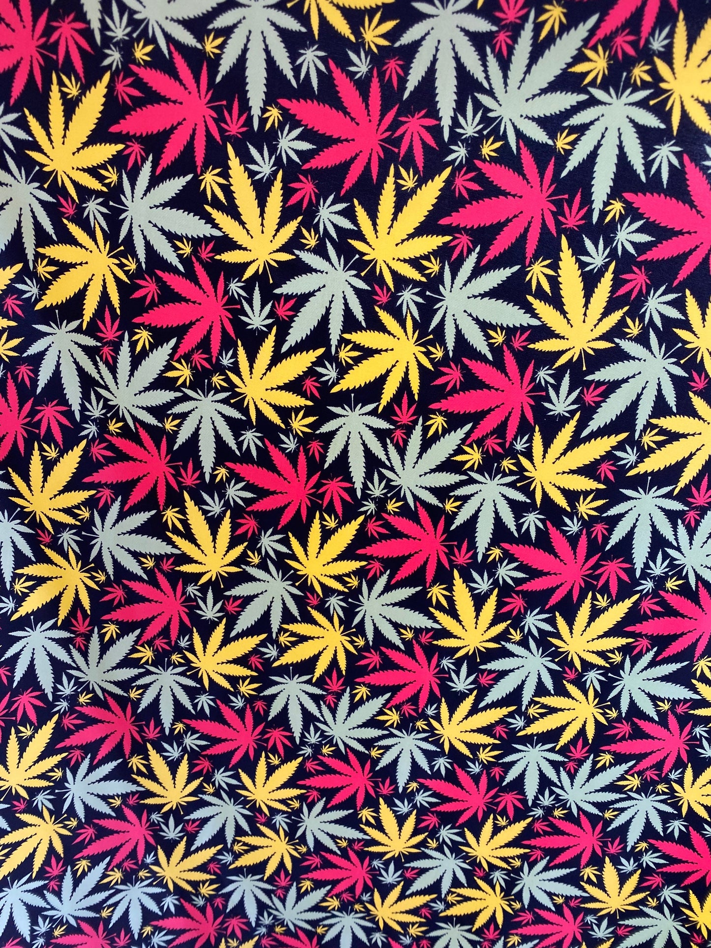 New weed leaf design print on nylon spandex 4-way Stretch 58/60” Sold by the YD. Ships worldwide from Los Angeles California USA.