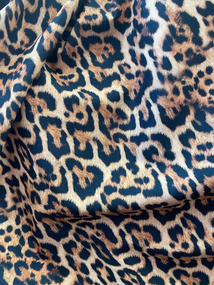 New leopard design print on nylon spandex 4-way stretch 58/60” Sold by the YD. Ships worldwide from Los Angeles California USA.