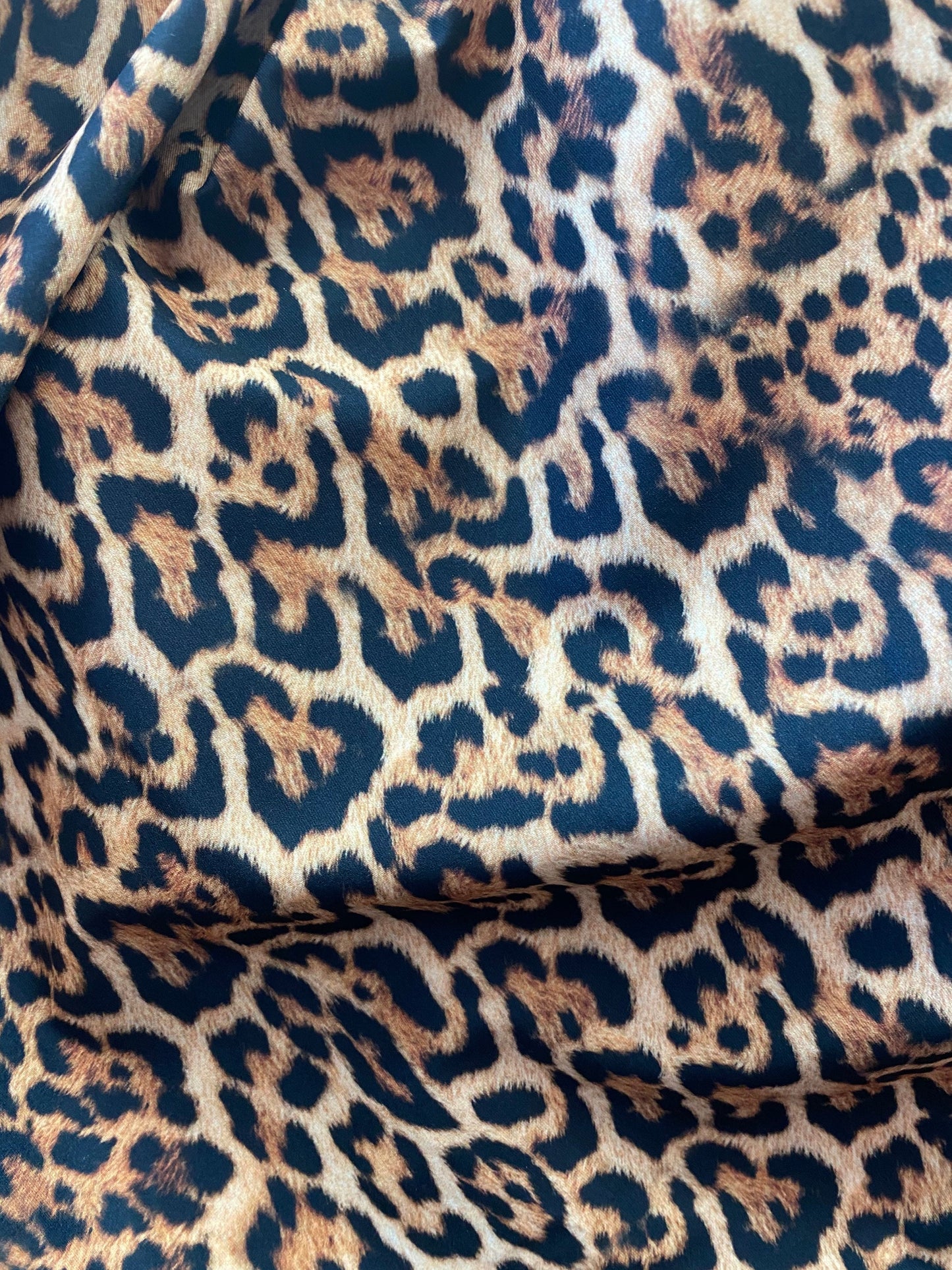 New leopard design print on nylon spandex 4-way stretch 58/60” Sold by the YD. Ships worldwide from Los Angeles California USA.