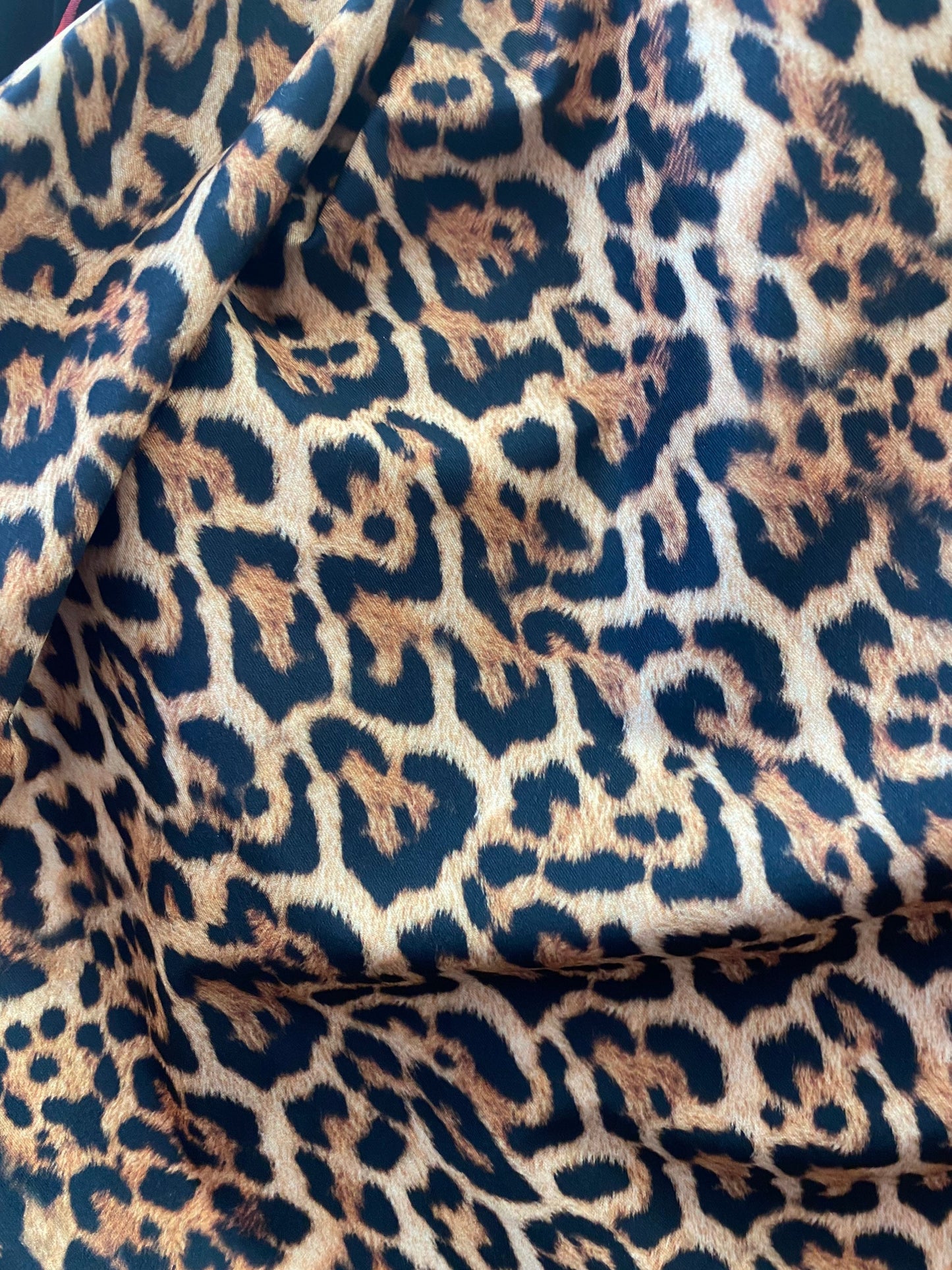 New leopard design print on nylon spandex 4-way stretch 58/60” Sold by the YD. Ships worldwide from Los Angeles California USA.