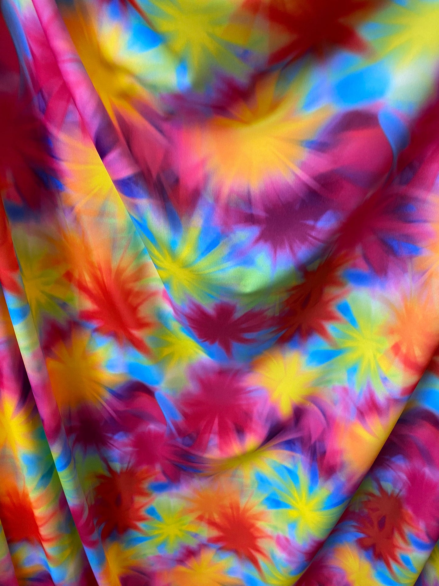 Great quality of tie dye nylon spandex star design 4-way stretch 58/60” Sold by the YD. Ships worldwide from Los Angeles California USA.