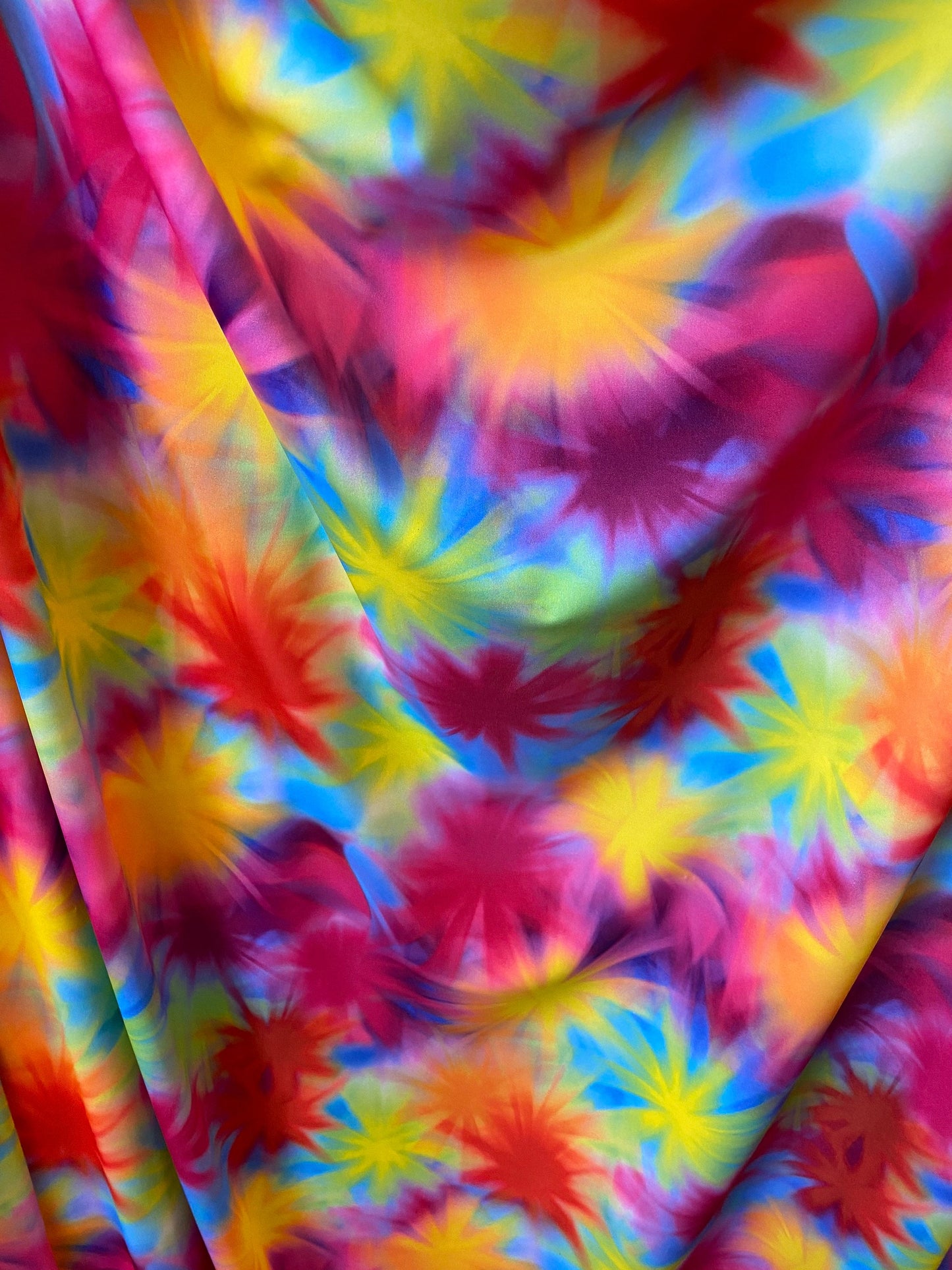 Great quality of tie dye nylon spandex star design 4-way stretch 58/60” Sold by the YD. Ships worldwide from Los Angeles California USA.