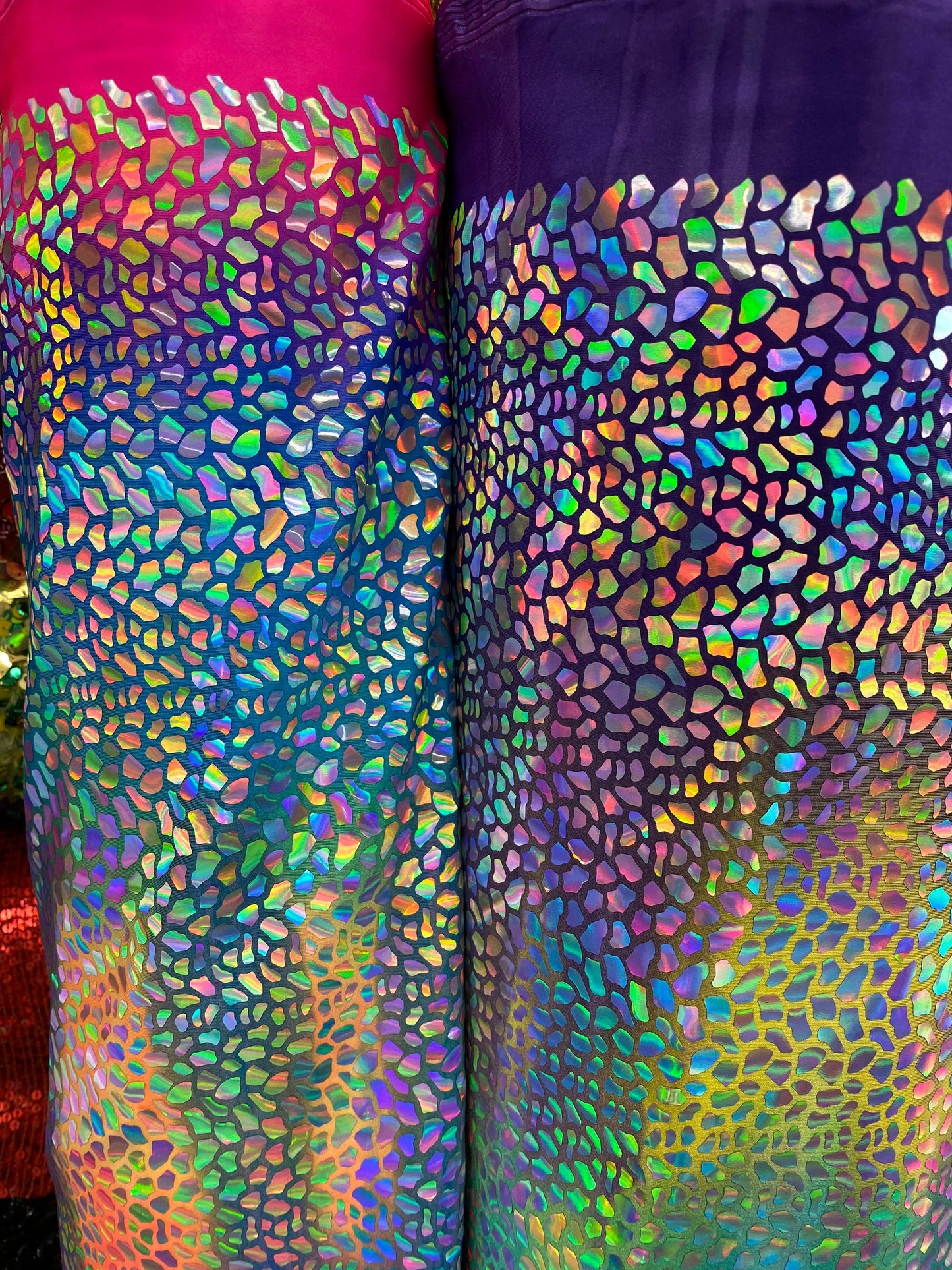 New Dragon scales Iridescent foil on Great tie dye nylon spandex 4-way stretch 58/60” Sold by the YD. New fabric in stock.