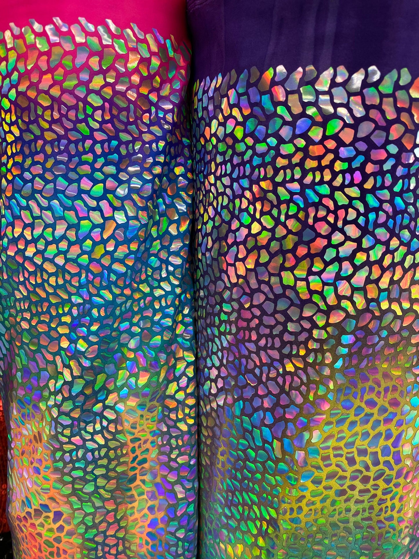 New Dragon scales Iridescent foil on Great tie dye nylon spandex 4-way stretch 58/60” Sold by the YD. New fabric in stock.