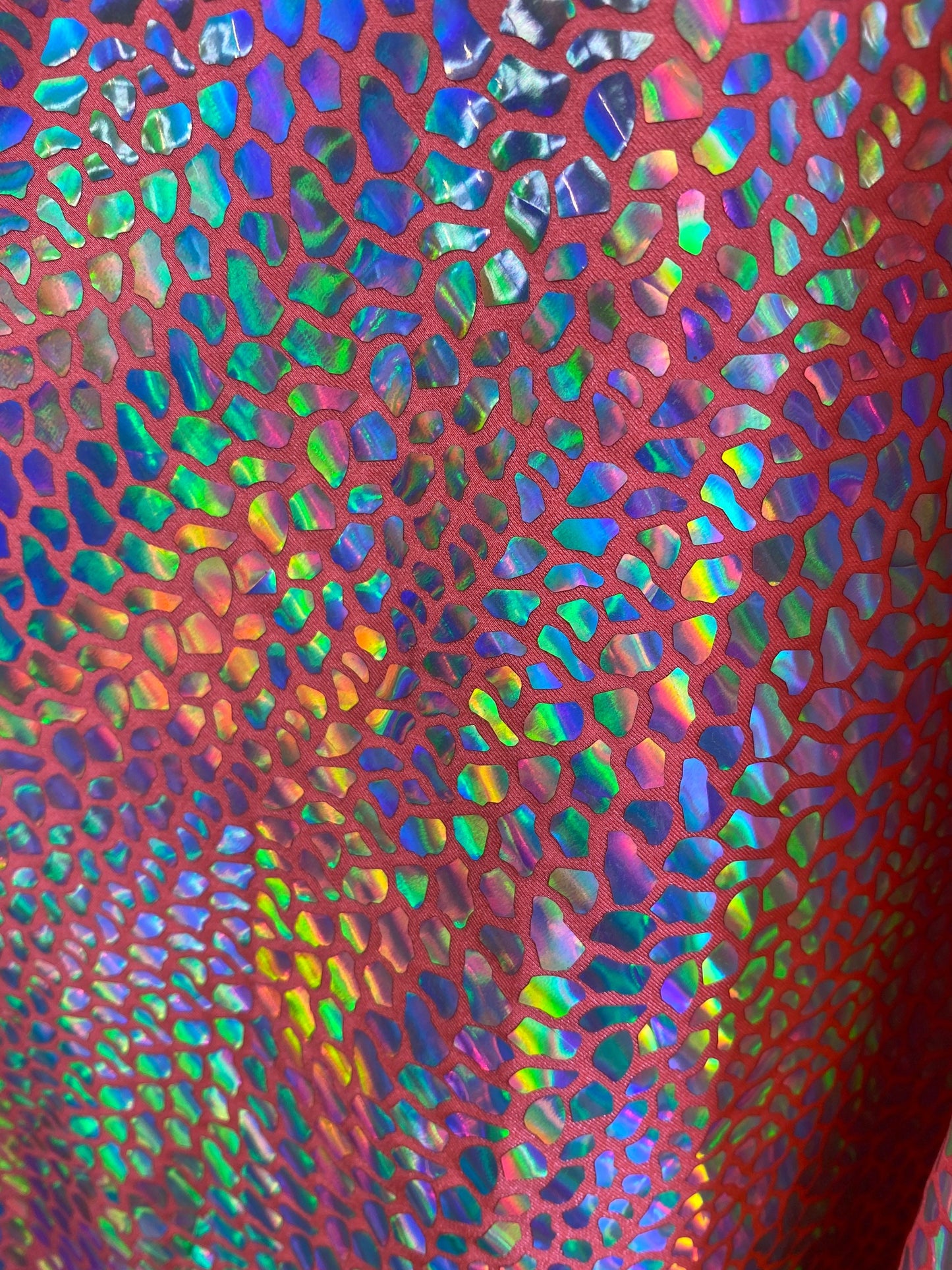 New dragon scales iridescent foil on nylon spandex 4-way stretch hologram metallic fabric 58/60” Sold by the YD. Ships worldwide from L.A CA