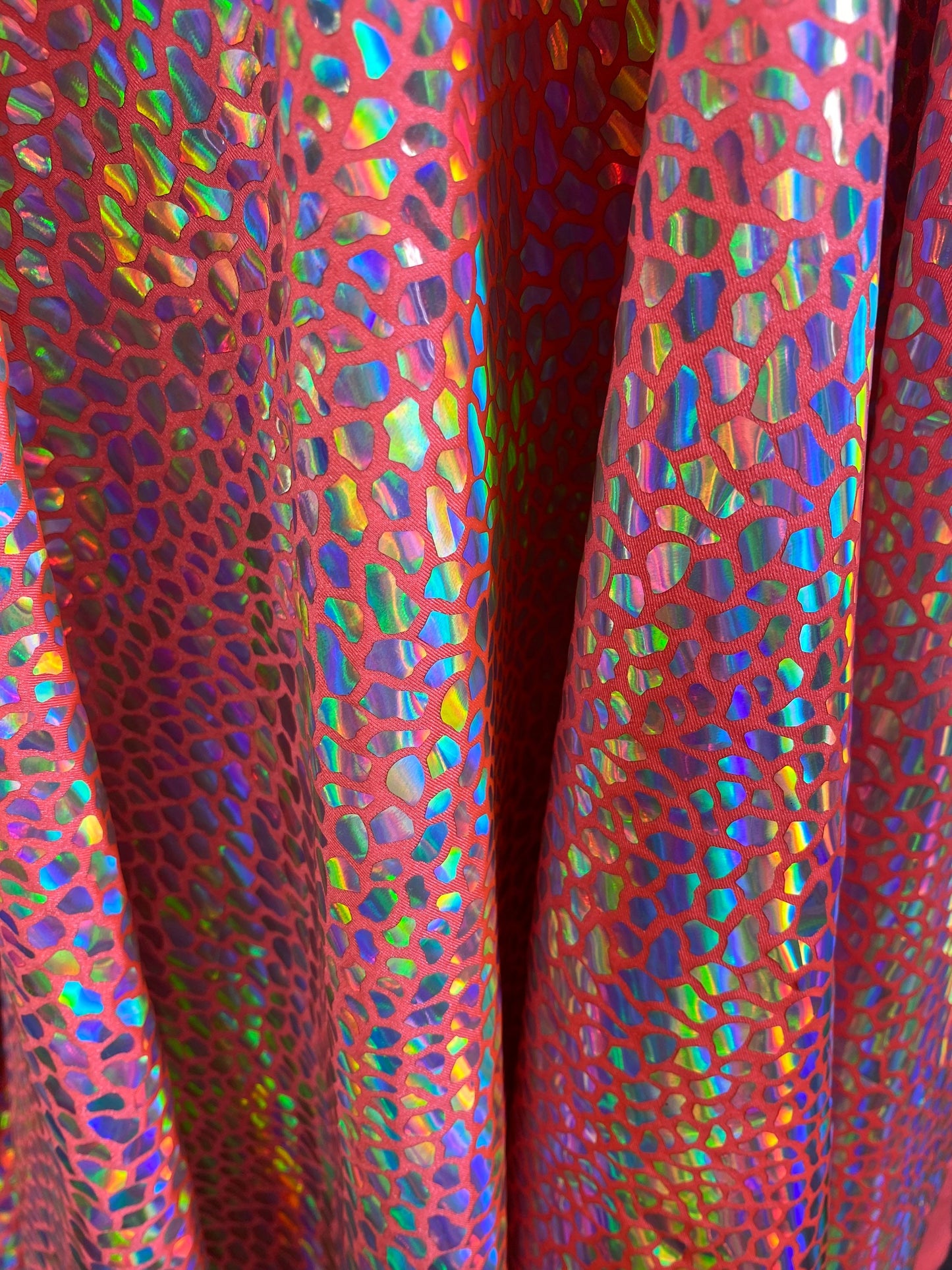 New dragon scales iridescent foil on nylon spandex 4-way stretch hologram metallic fabric 58/60” Sold by the YD. Ships worldwide from L.A CA