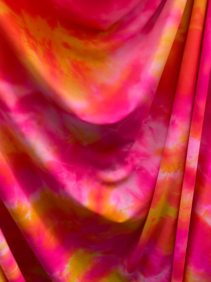 Great tie dye design best quality of nylon spandex 4-way stretch 58/60” Sold by the YD. Ships worldwide from Los Angeles California USA.