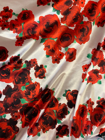 New poly shining spandex with red flower design 4-way stretch 58/60” Sold by the YD. Ships worldwide from Los Angeles California USA.