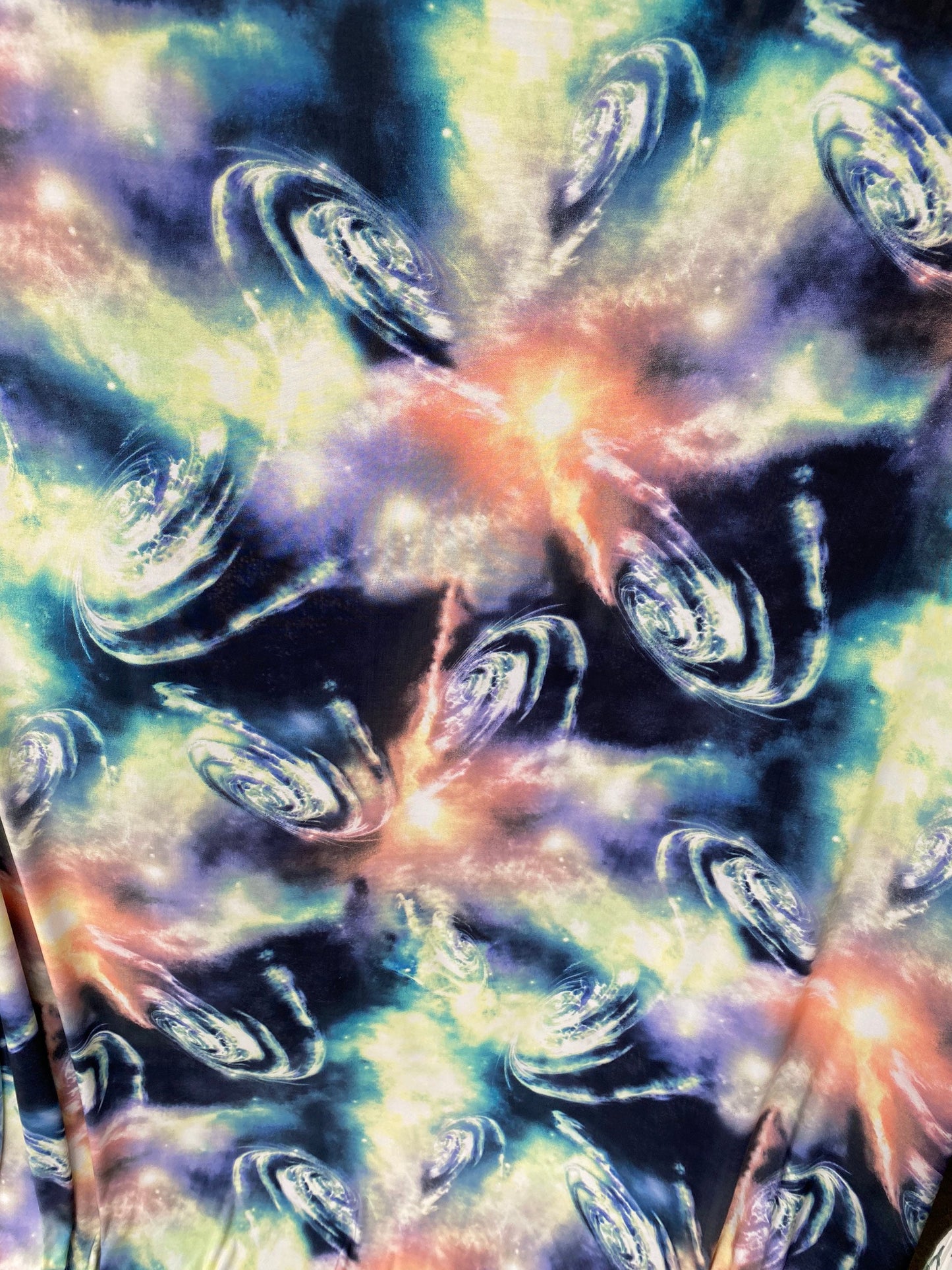 Universe design multicolor print on poly spandex 4-way stretch 58/60” Sold by the YD. Ships worldwide from Los Angeles California USA.