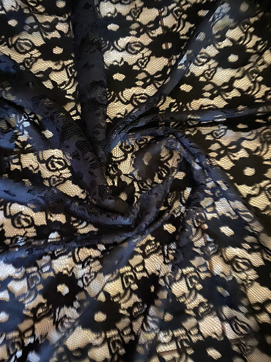 New embroidered black lace  flower design 2-way stretch 55/57” Sold by the YD. Ships worldwide from Los Angeles California USA.