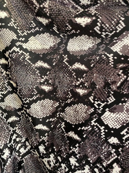 New Exotic snake design print on poly techno spandex 2-way stretch 58/60” Sold by the YD. Ships worldwide from Los Ángeles California USA.