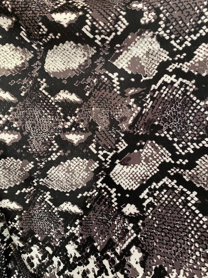 New Exotic snake design print on poly techno spandex 2-way stretch 58/60” Sold by the YD. Ships worldwide from Los Ángeles California USA.