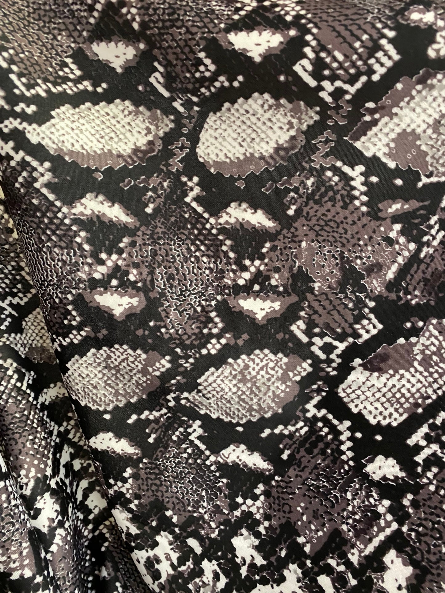 New Exotic snake design print on poly techno spandex 2-way stretch 58/60” Sold by the YD. Ships worldwide from Los Ángeles California USA.