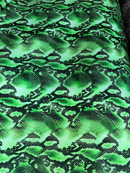 New venom snake design green/black print on best quality of nylon spandex 4-way stretch 58/60” Sold by the YD. Ships worldwide from L.A CA