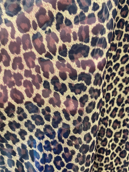 New exotic Cheetah print on nylon power mesh 4way stretch 58/60” Sold by the YD. Ships worldwide from Los Angeles California USA.