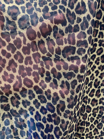 New exotic Cheetah print on nylon power mesh 4way stretch 58/60” Sold by the YD. Ships worldwide from Los Angeles California USA.