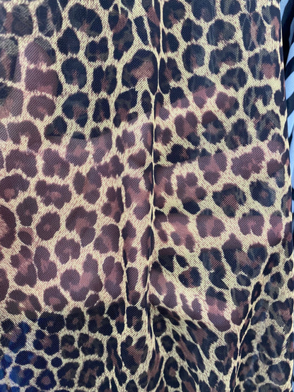 New exotic Cheetah print on nylon power mesh 4way stretch 58/60” Sold by the YD. Ships worldwide from Los Angeles California USA.