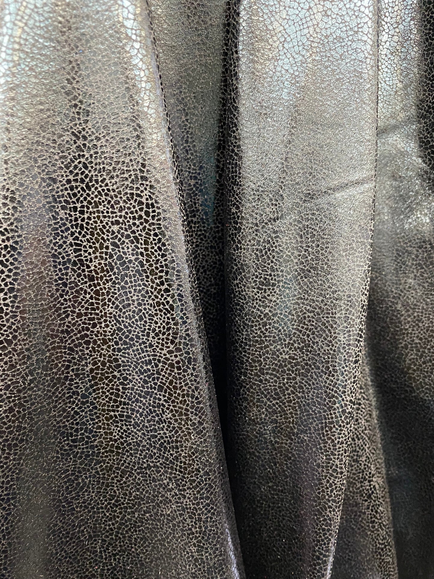 Dragón scales black foil on nylon spandex best quality 4-way stretch 58/60” Sold by the YD. Ships worldwide from Los Angeles California USA.