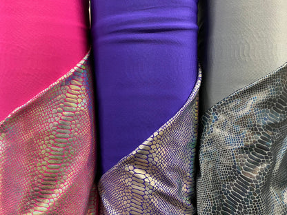 Ilusión Anaconda design crystal iridescent foil on nylon spandex 4-way stretch 58/60” Sold by the YD. Ships worldwide from Los Angeles CA.