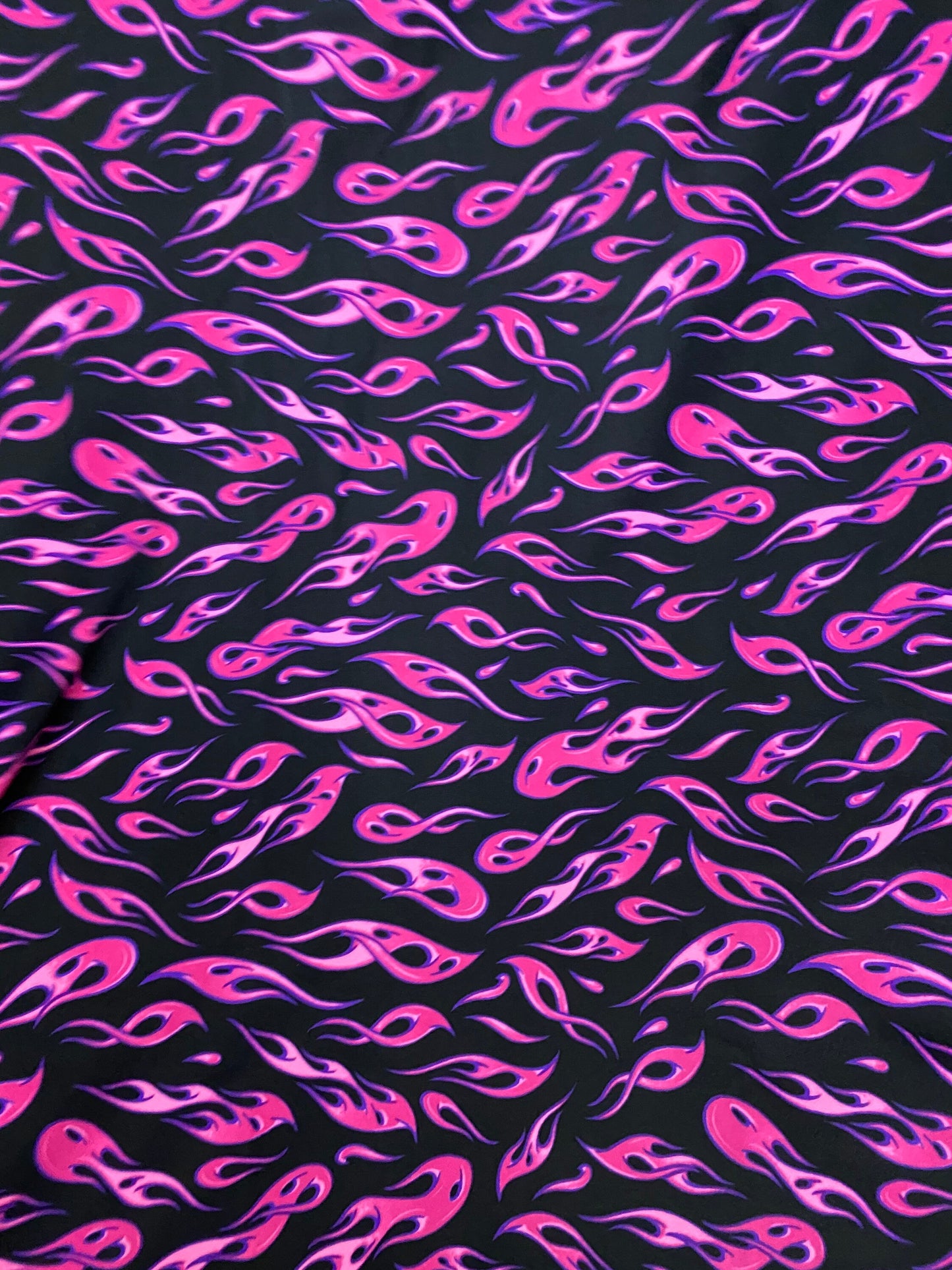 New modern hot flames design it glows in the dark with a black light print on best quality of nylon spandex 4-way stretch 58/60”