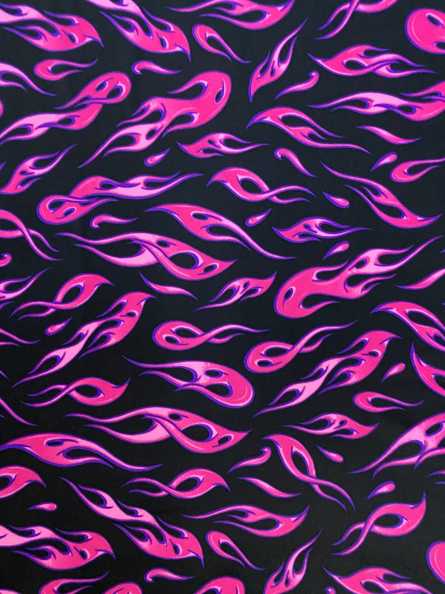 New modern hot flames design it glows in the dark with a black light print on best quality of nylon spandex 4-way stretch 58/60”