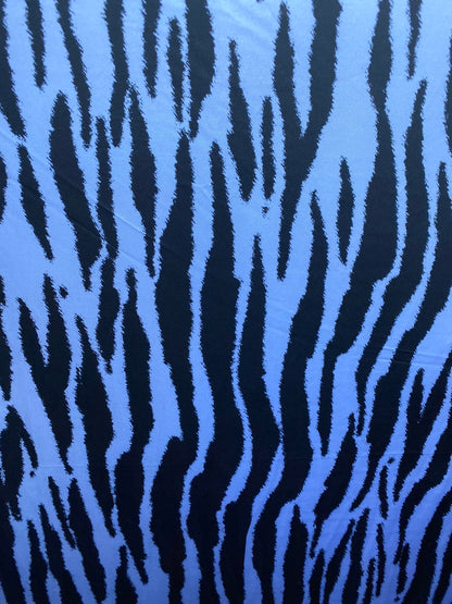 New Bengal tiger design print on nylon spandex 4-way stretch 58/60” Sold by the YD. Ships worldwide from Los Angeles California USA.