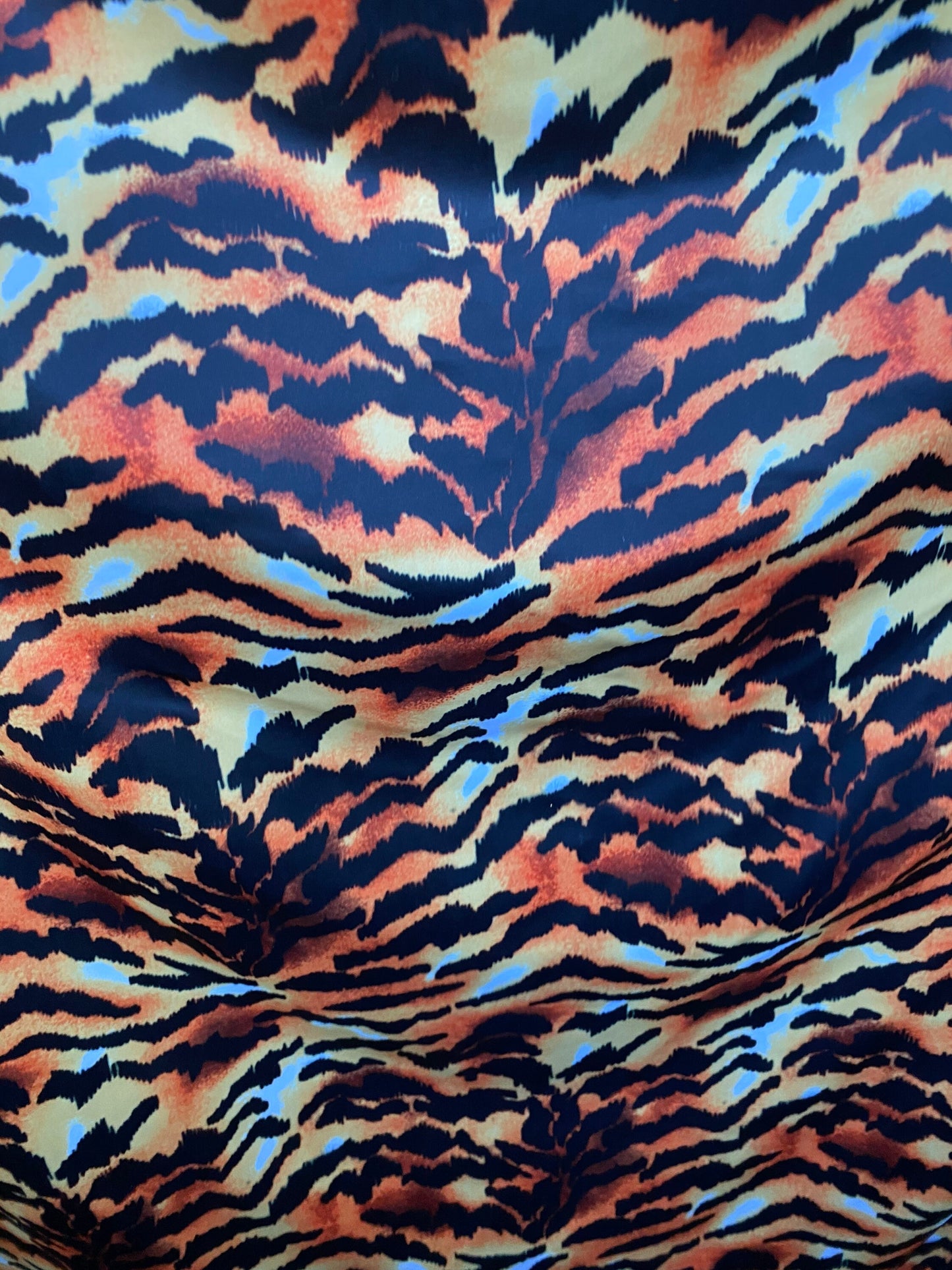 Tiger design exotic animal print on poly spandex 4-way stretch 58/60” Sold by the YD. Ships worldwide from Los Angeles California USA.