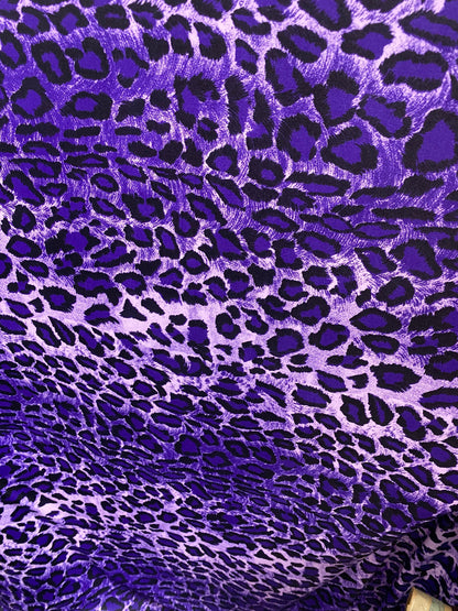 Exotic leopard design purple/black print on nylon spandex 4-way stretch 58/60” Sold by the YD. Ships worldwide from Los Angeles California