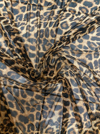 New exotic leopard design print on power mesh 4-way stretch 58/60” Sold by the YD. Ships worldwide from Los Angeles California USA.