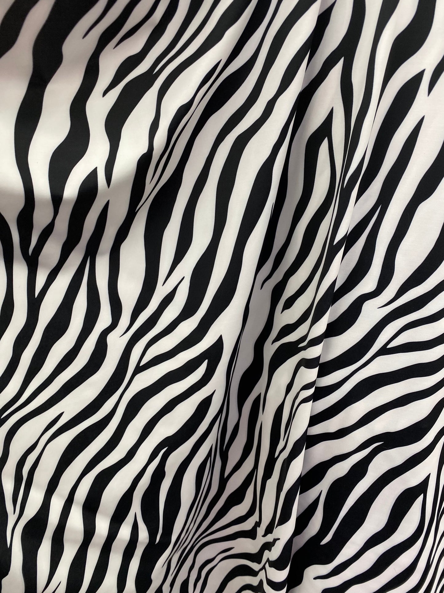 New exotic zebra design print on nylon spandex 4-way Stretch 58/60” Sold by the YD. Ships worldwide from Los Angeles California USA.