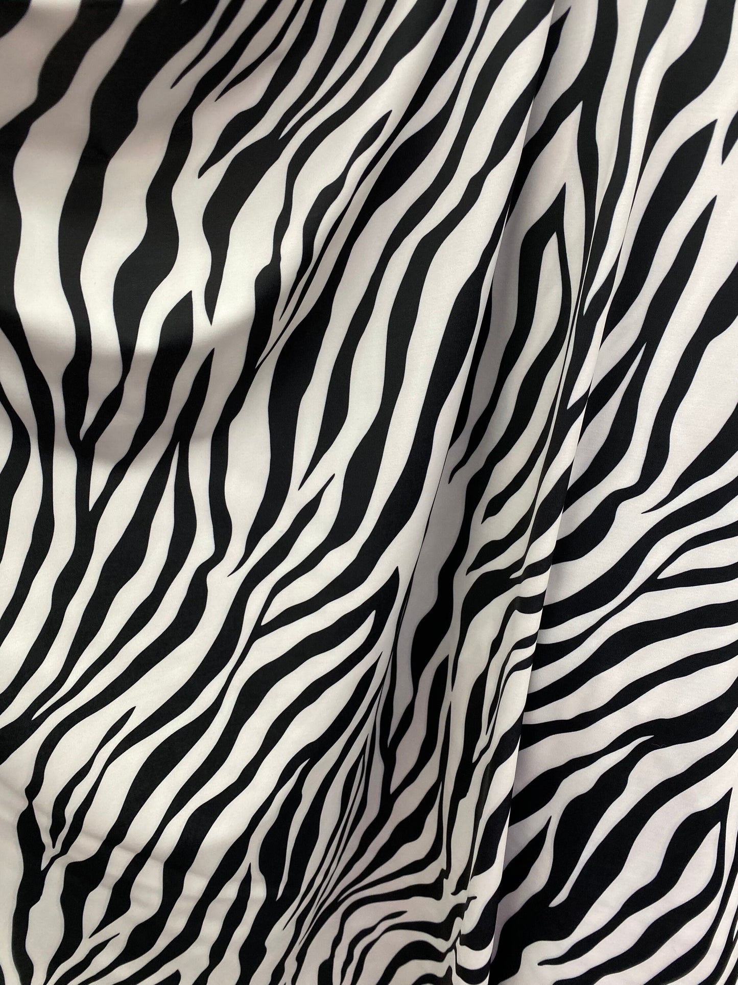 New exotic zebra design print on nylon spandex 4-way Stretch 58/60” Sold by the YD. Ships worldwide from Los Angeles California USA.