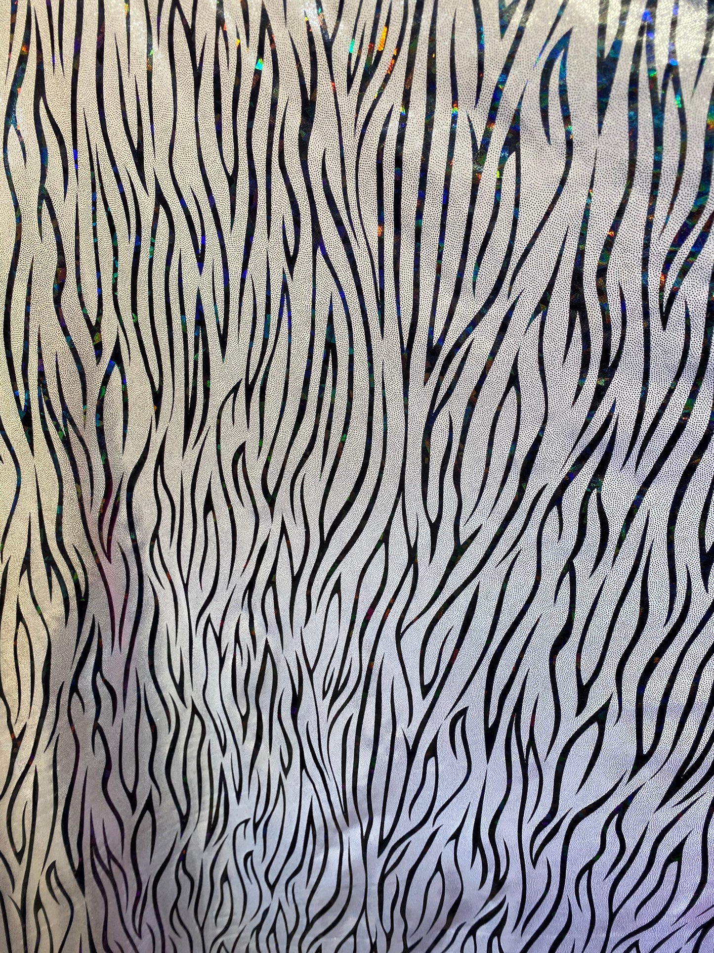 New abstract zebra design hologram foggy foil nylon spandex 4-way stretch 58/60” Sold by the YD. Ships worldwide from Los Angeles California