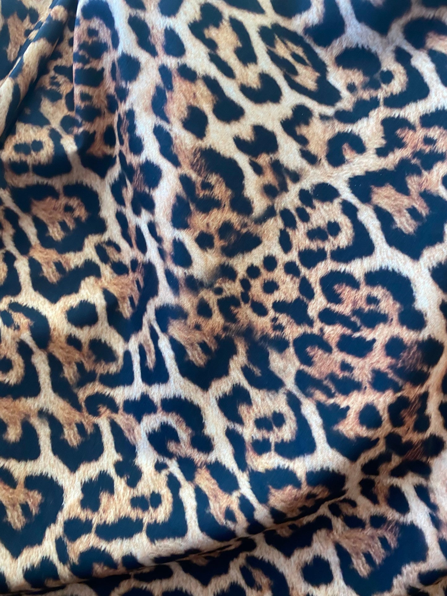 New leopard design print on nylon spandex 4-way stretch 58/60” Sold by the YD. Ships worldwide from Los Angeles California USA.