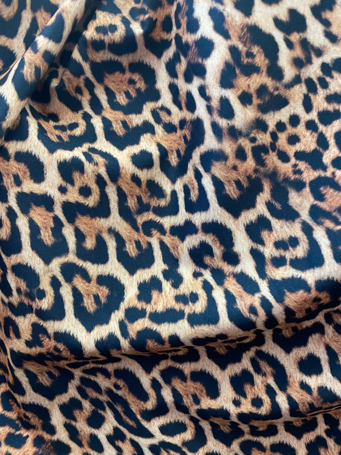 New leopard design print on nylon spandex 4-way stretch 58/60” Sold by the YD. Ships worldwide from Los Angeles California USA.