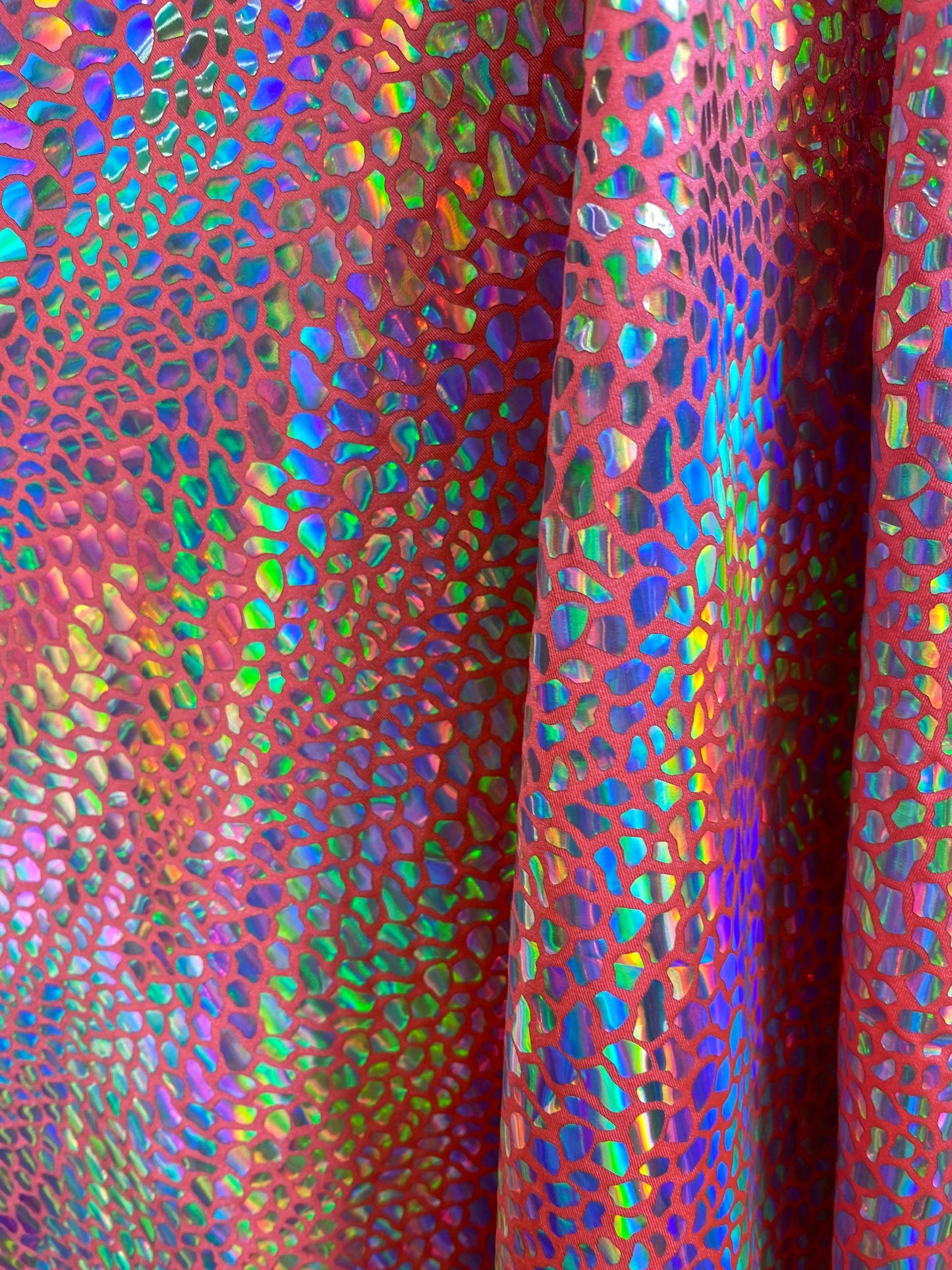 New dragon scales iridescent foil on nylon spandex 4-way stretch hologram metallic fabric 58/60” Sold by the YD. Ships worldwide from L.A CA