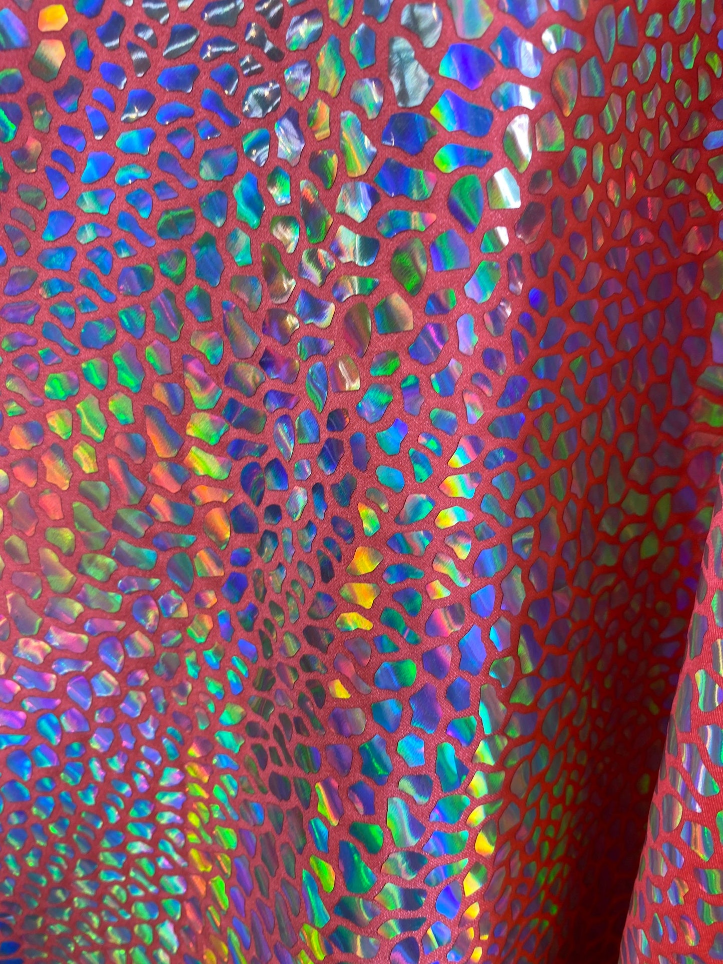 New dragon scales iridescent foil on nylon spandex 4-way stretch hologram metallic fabric 58/60” Sold by the YD. Ships worldwide from L.A CA