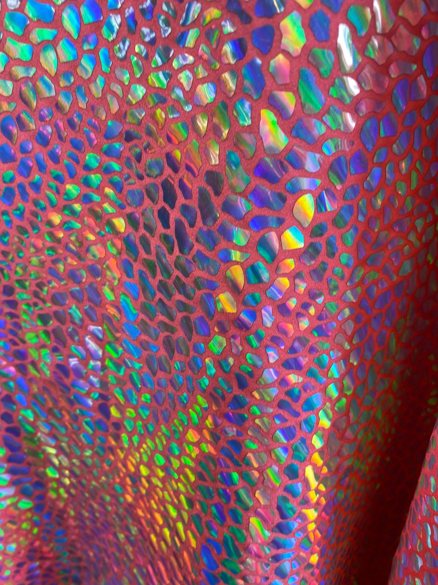 New dragon scales iridescent foil on nylon spandex 4-way stretch hologram metallic fabric 58/60” Sold by the YD. Ships worldwide from L.A CA