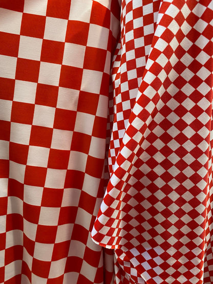 New poly spandex Checkered design 1”-1/2” print on poly spandex 4-way stretch 58/60” Sold by the YD. Ships worldwide from Los Angeles CA.