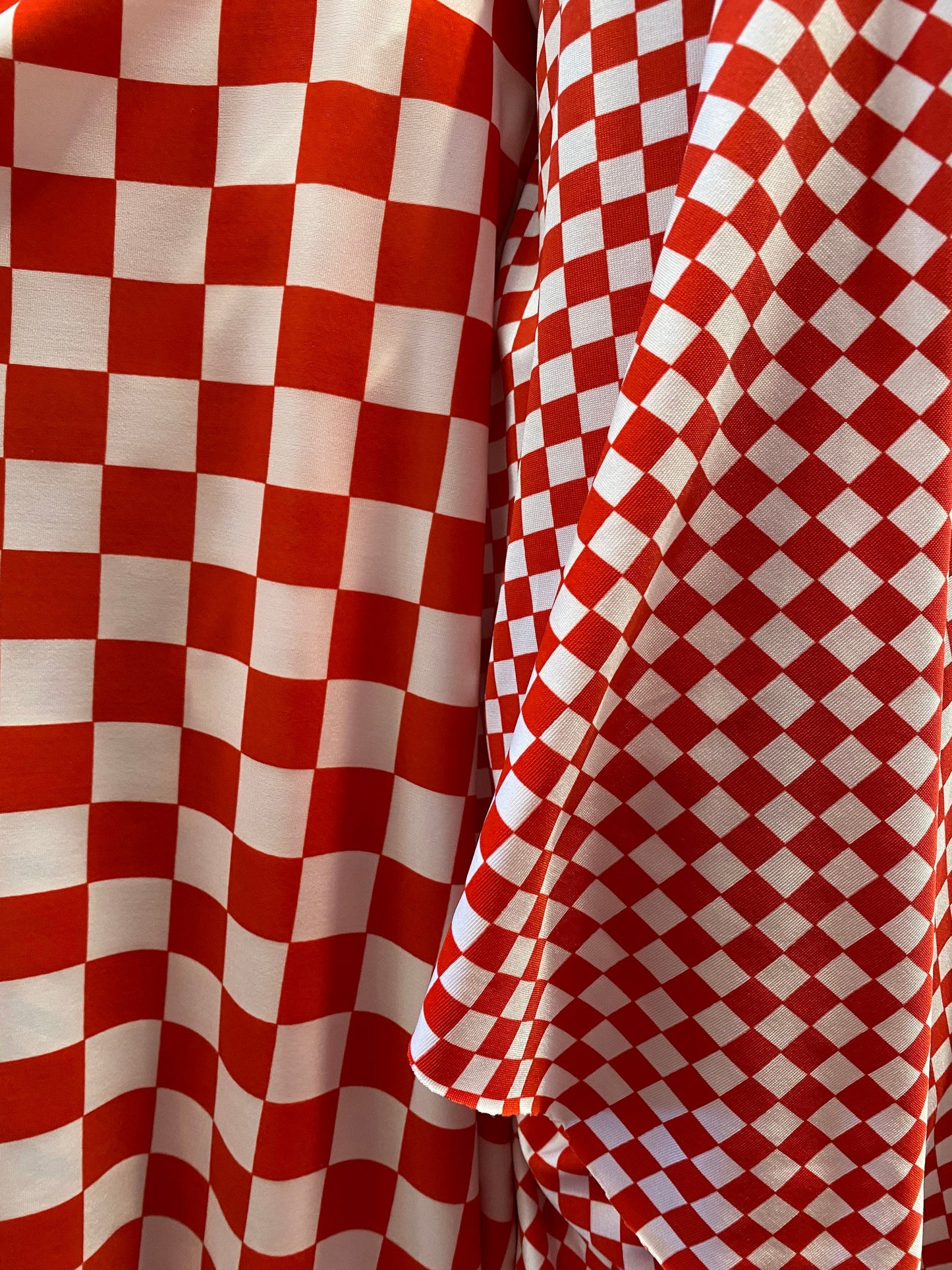 New poly spandex Checkered design 1”-1/2” print on poly spandex 4-way stretch 58/60” Sold by the YD. Ships worldwide from Los Angeles CA.