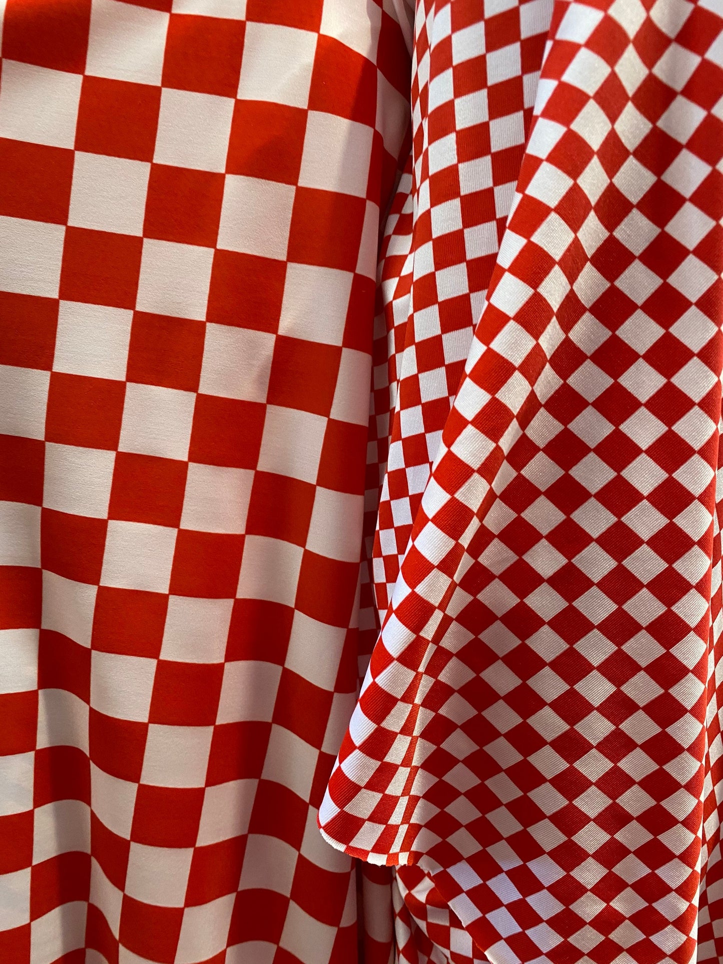 New poly spandex Checkered design 1”-1/2” print on poly spandex 4-way stretch 58/60” Sold by the YD. Ships worldwide from Los Angeles CA.