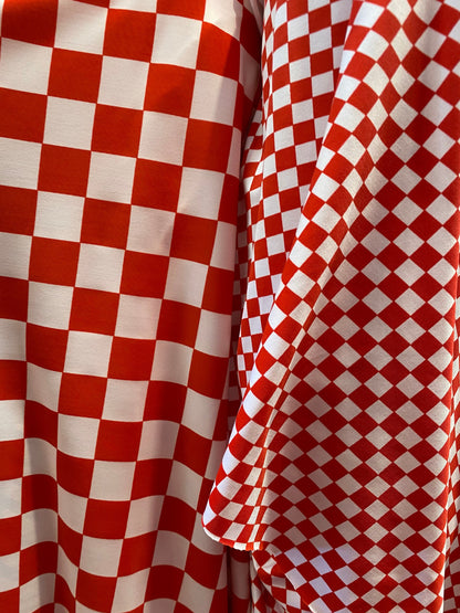 New poly spandex Checkered design 1”-1/2” print on poly spandex 4-way stretch 58/60” Sold by the YD. Ships worldwide from Los Angeles CA.